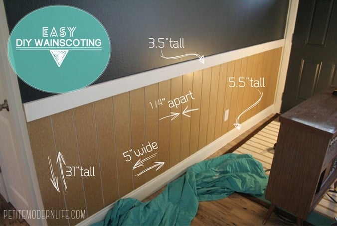 The words "DIY Easy Wainscoting" is on the bottom of a picture of a wall with grey paint and brown wainscoting. On the wall are written measurements and notes.